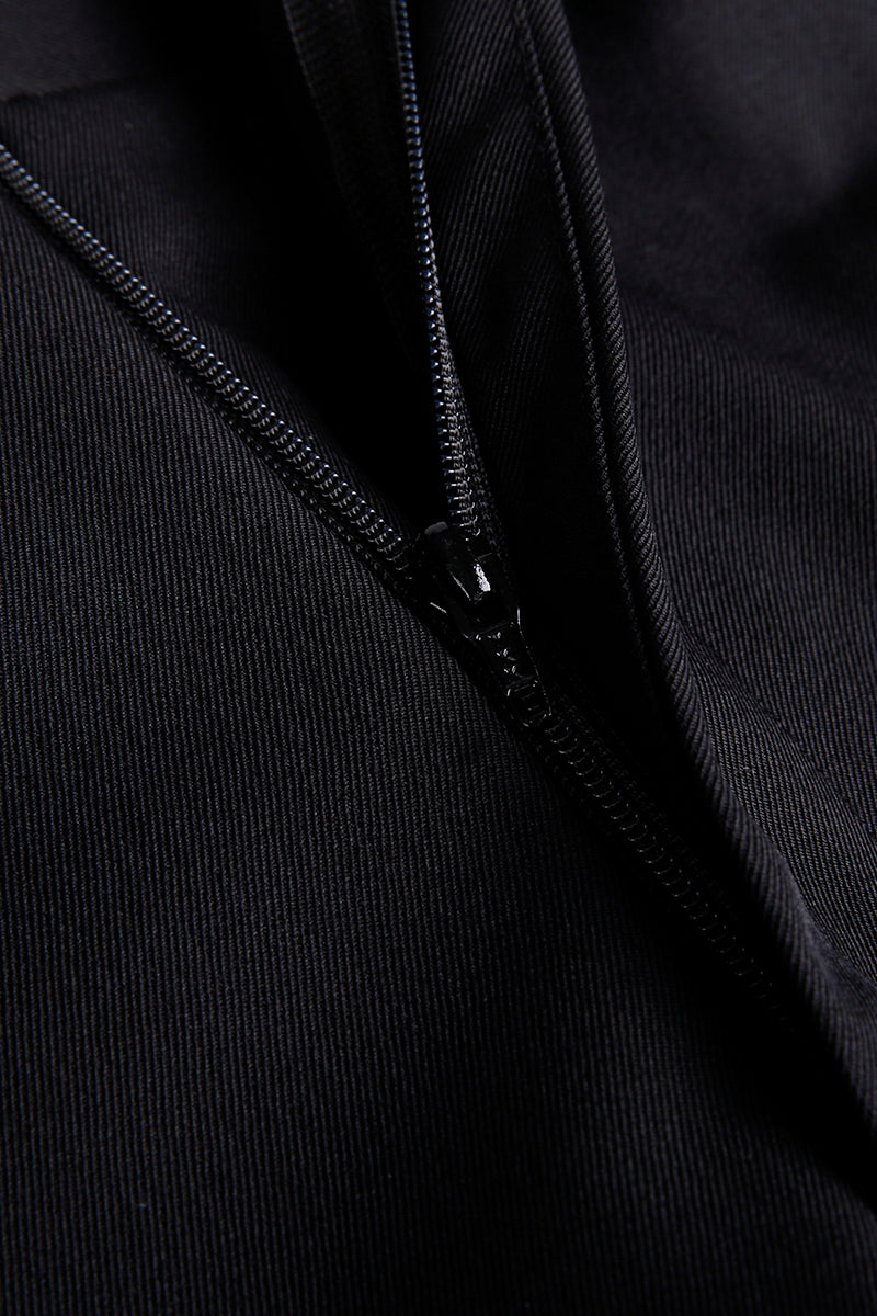 “Luxury black wool fabric texture and custom zipper on bespoke men’s dress pants