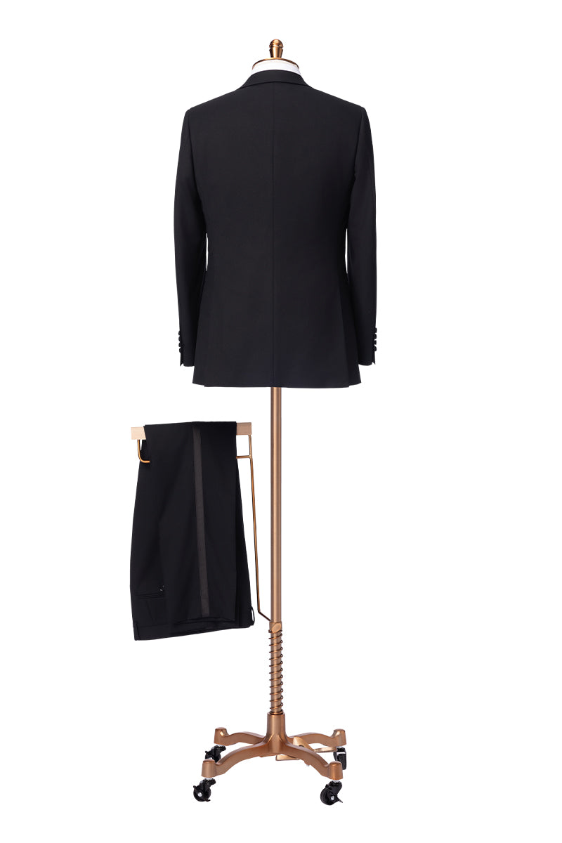 Black peak lapel tuxedo styled for wedding or black-tie even