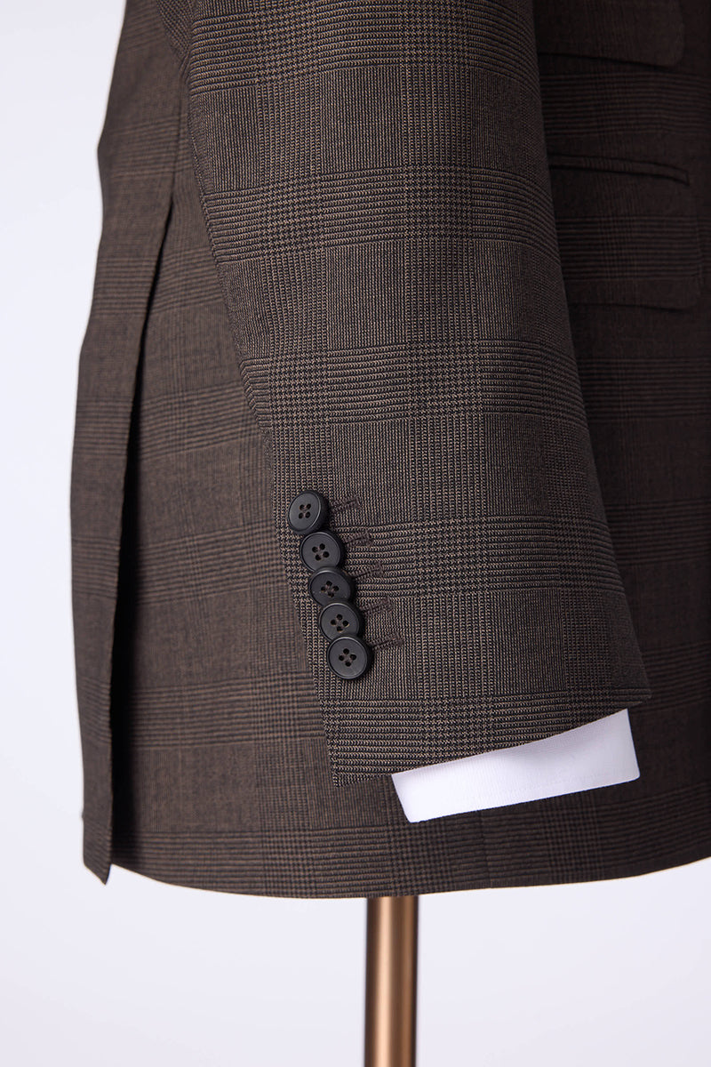 Custom buttons on tailored brown performance plaid suit