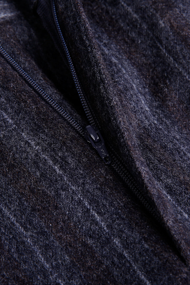 Custom zipper on tailored grey pinstripe trousers