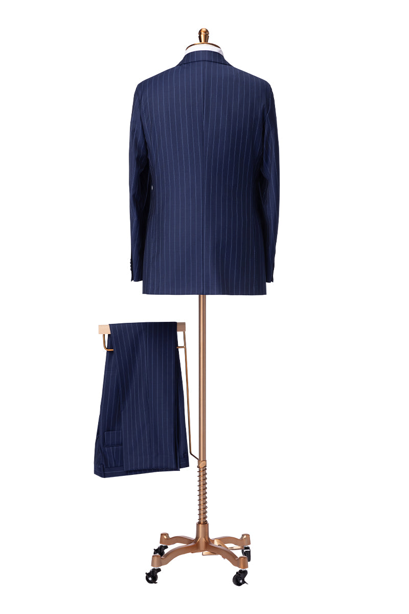 Double-breasted navy pinstripe suit styled for wedding or business attire