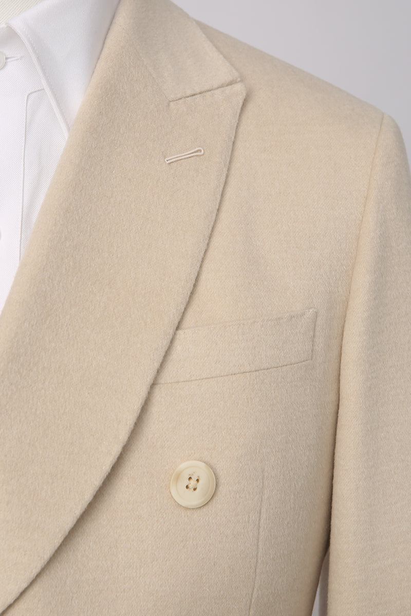 Custom lapel and buttons on tailored light khaki camel hair and silk suit