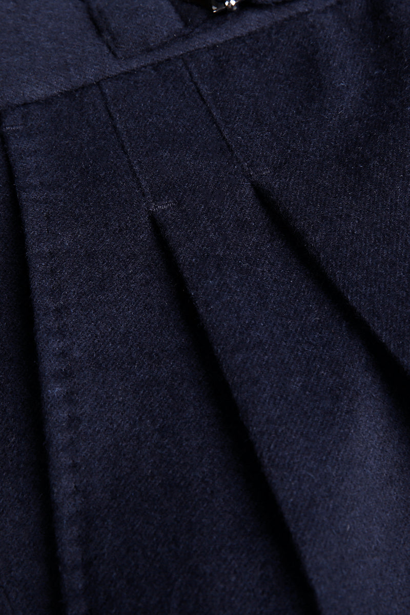Custom waistband and pleats on tailored navy blue cashmere trousers