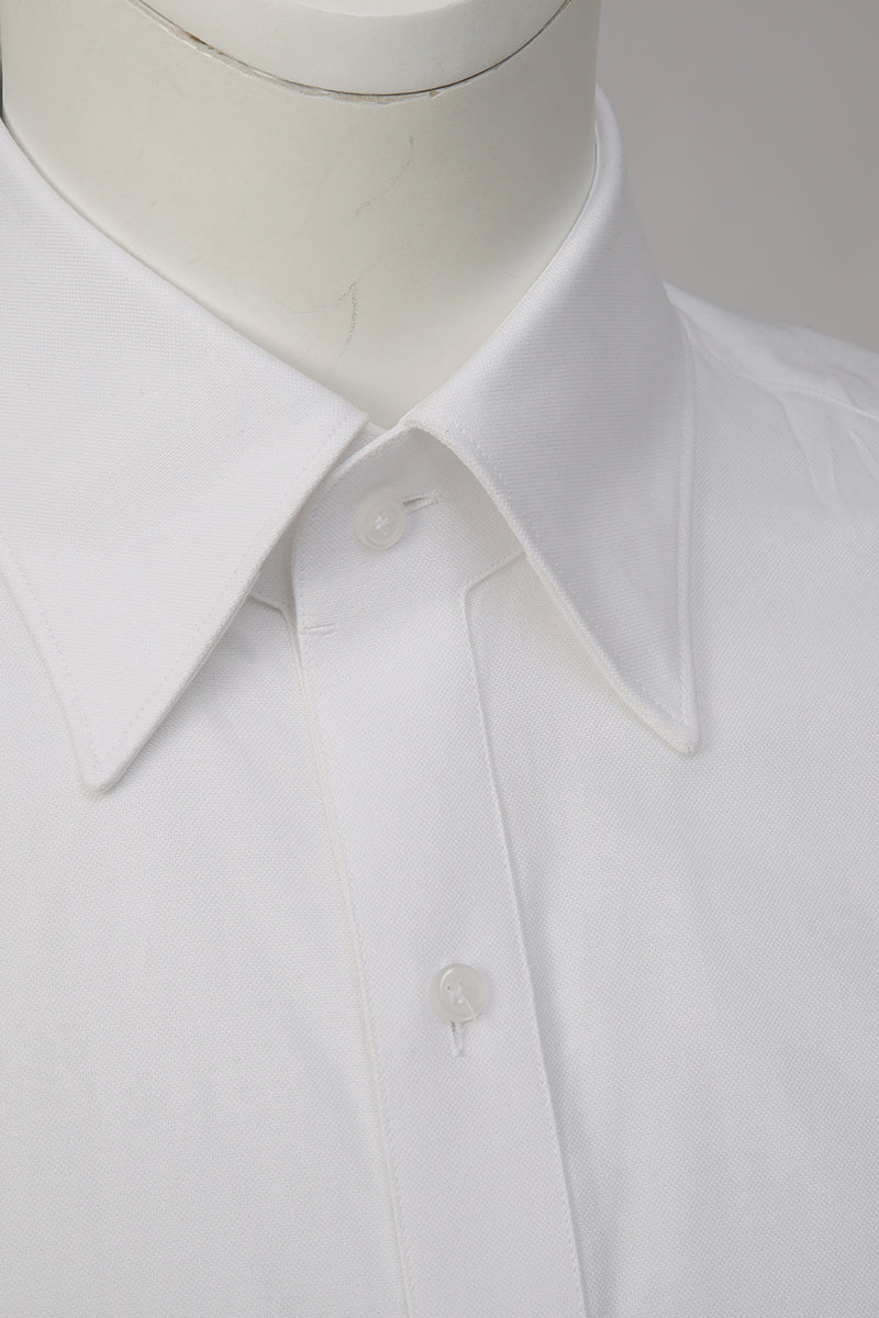 Custom collar and buttons on tailored white dress shirt