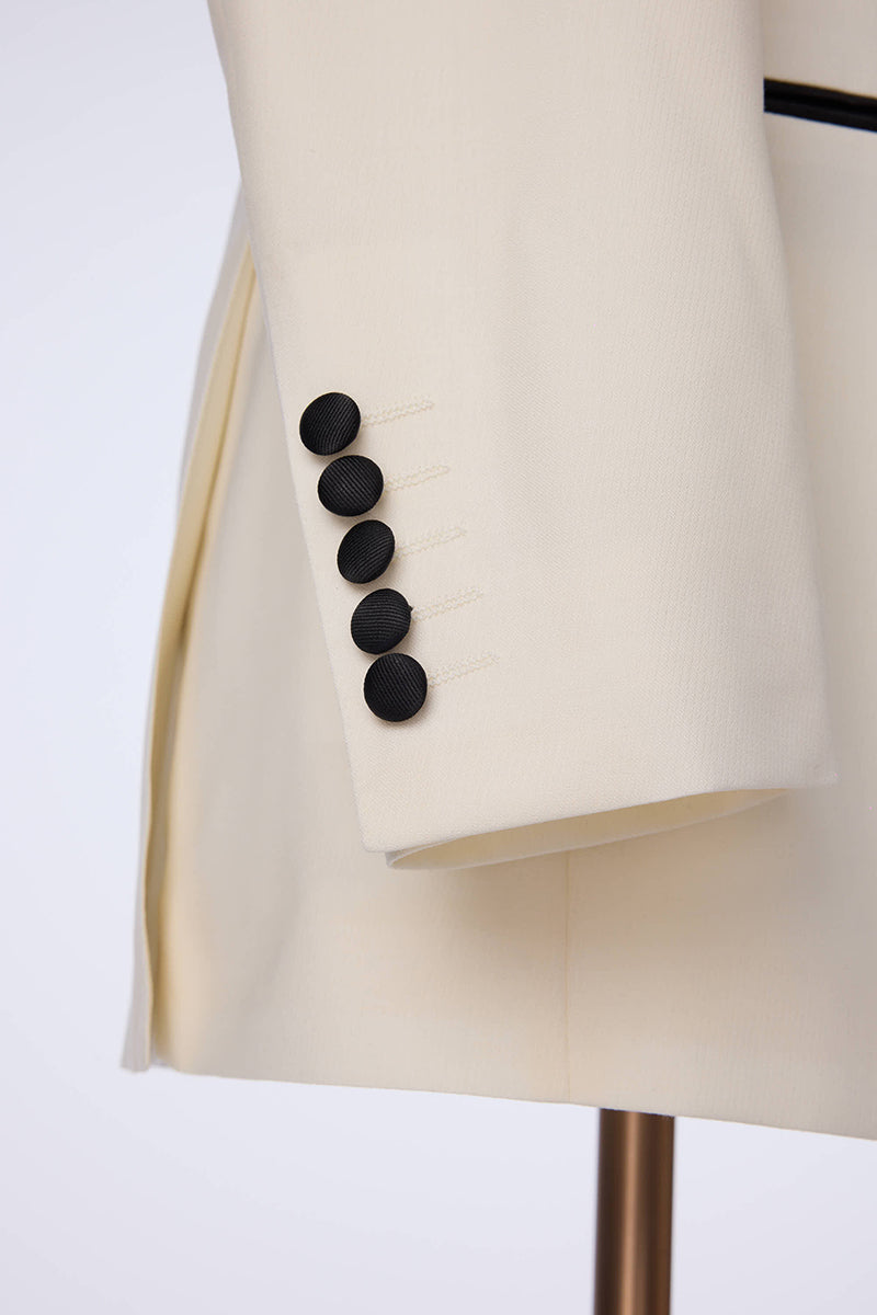 Custom sleeve buttons on tailored white dinner jacket tuxedo
