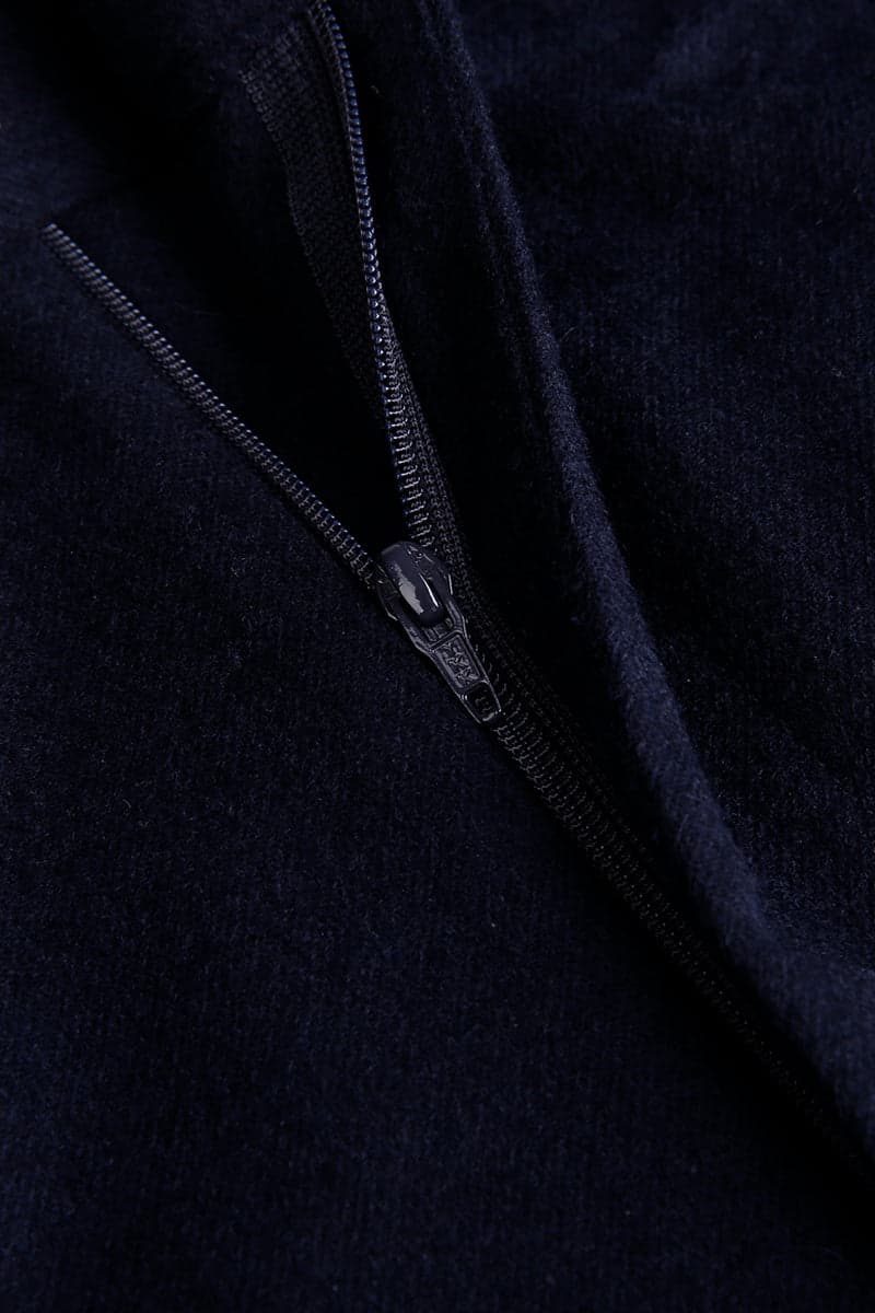 Close detail of navy cashmere silk fabric from the Crowned Legacy cloth library.