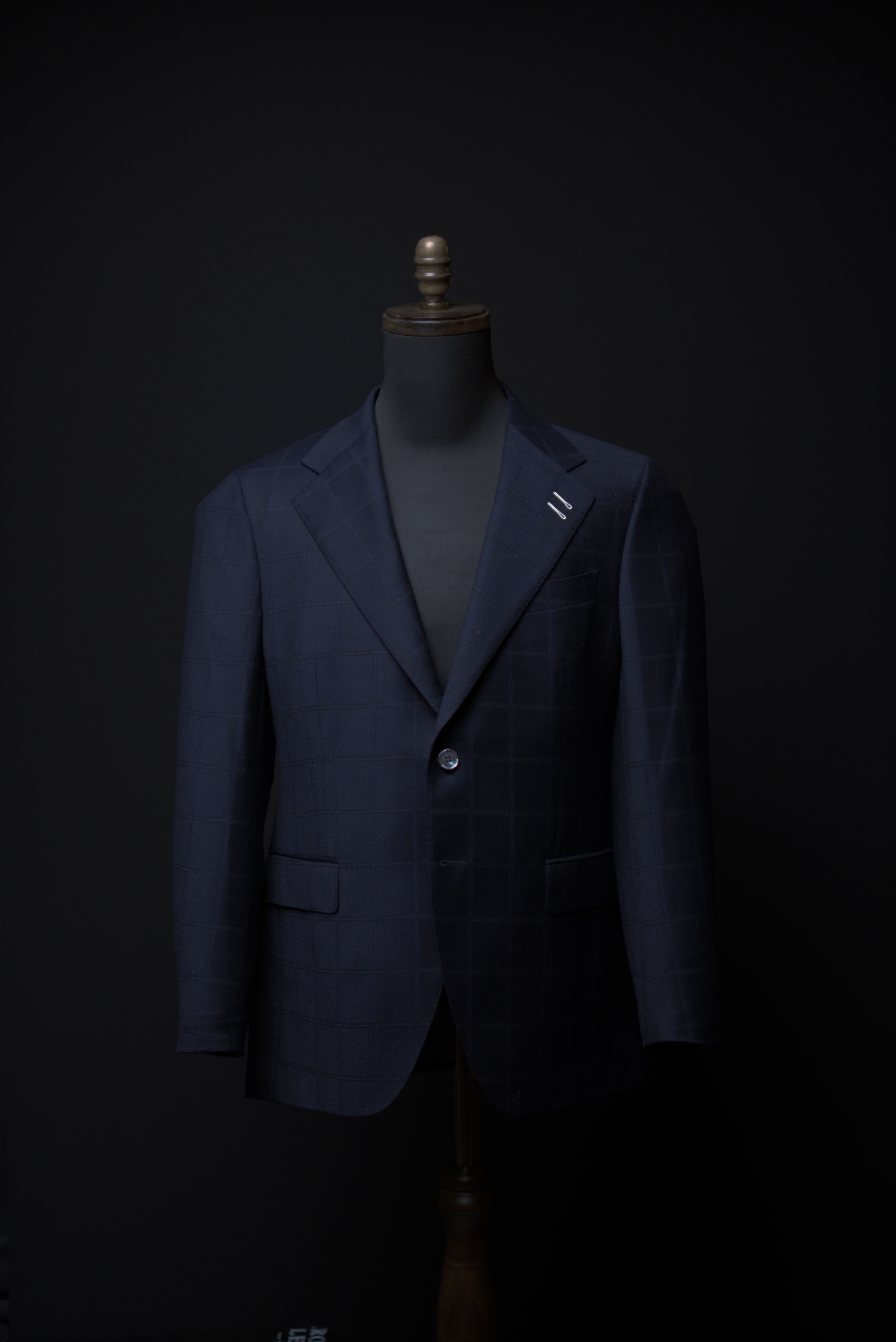 Dark navy windowpane · single-breasted · two-button · notch lapel