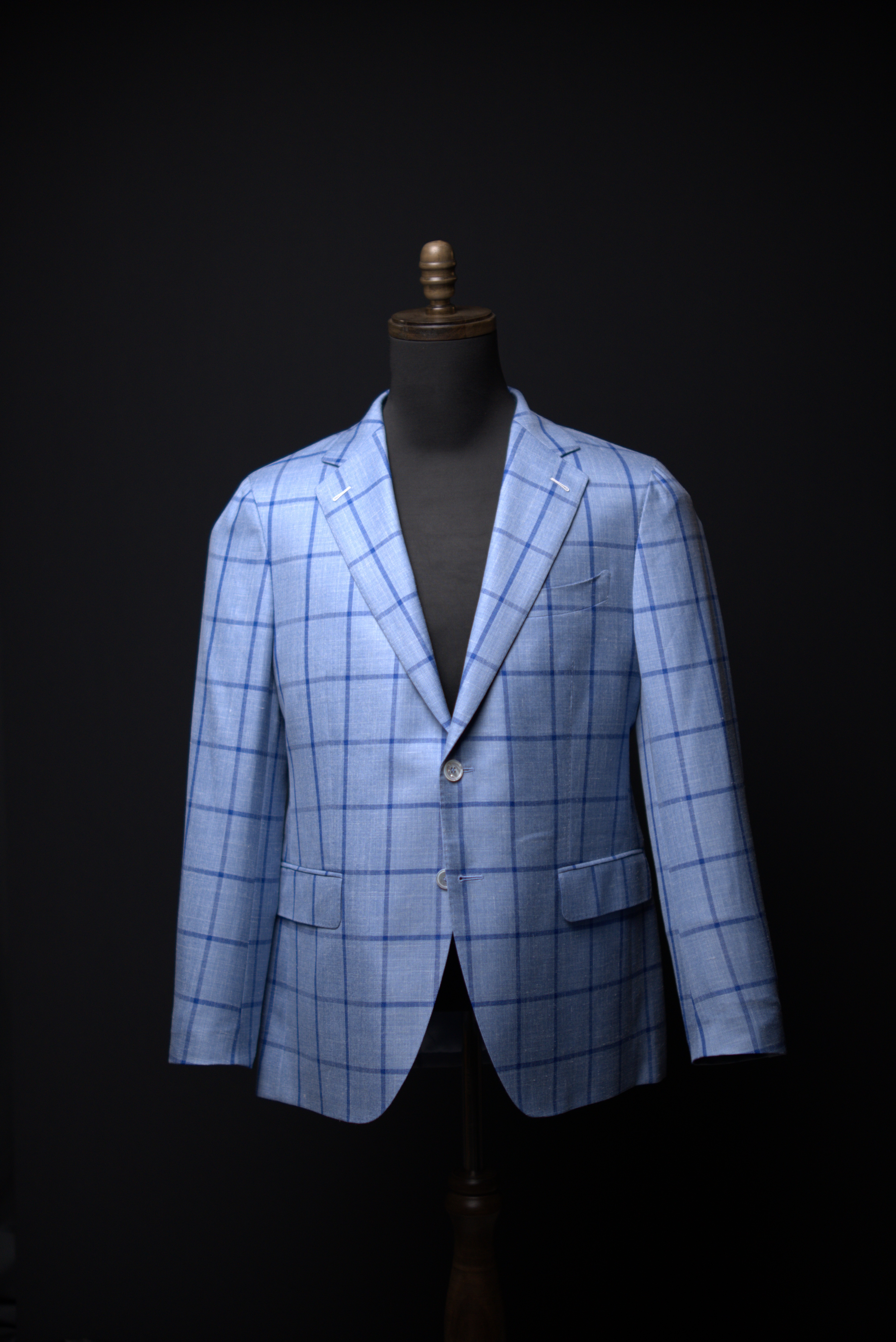 Light blue windowpane with darker blue overcheck · single-breasted · two-button · notch lapel