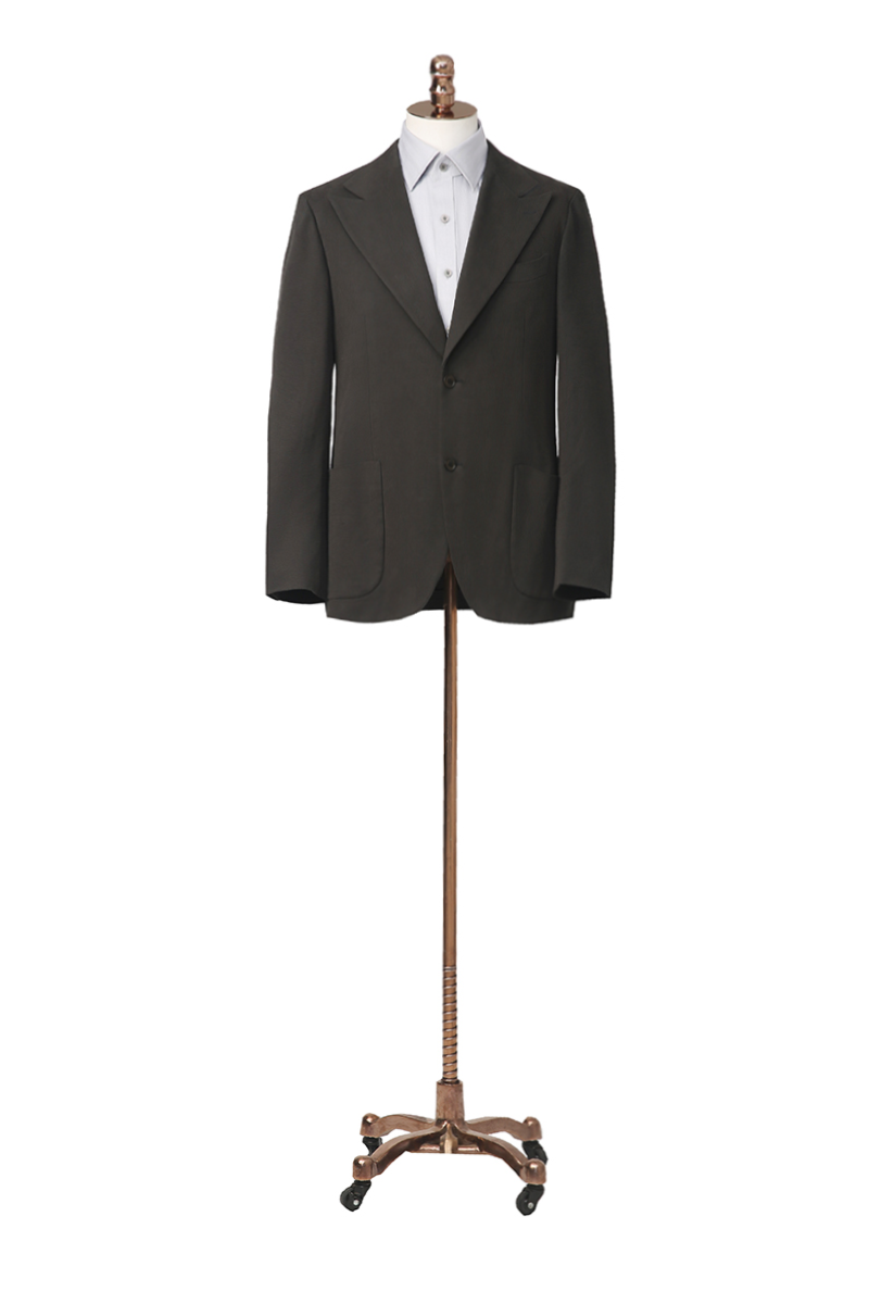 Bespoke dark green suit jacket – luxury men’s fashion with custom tailored fit