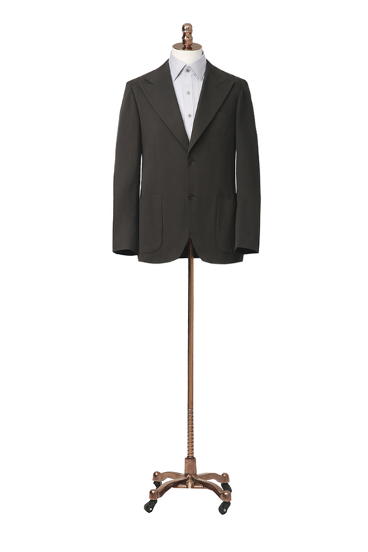 Bespoke dark green suit jacket – luxury men’s fashion with custom tailored fit