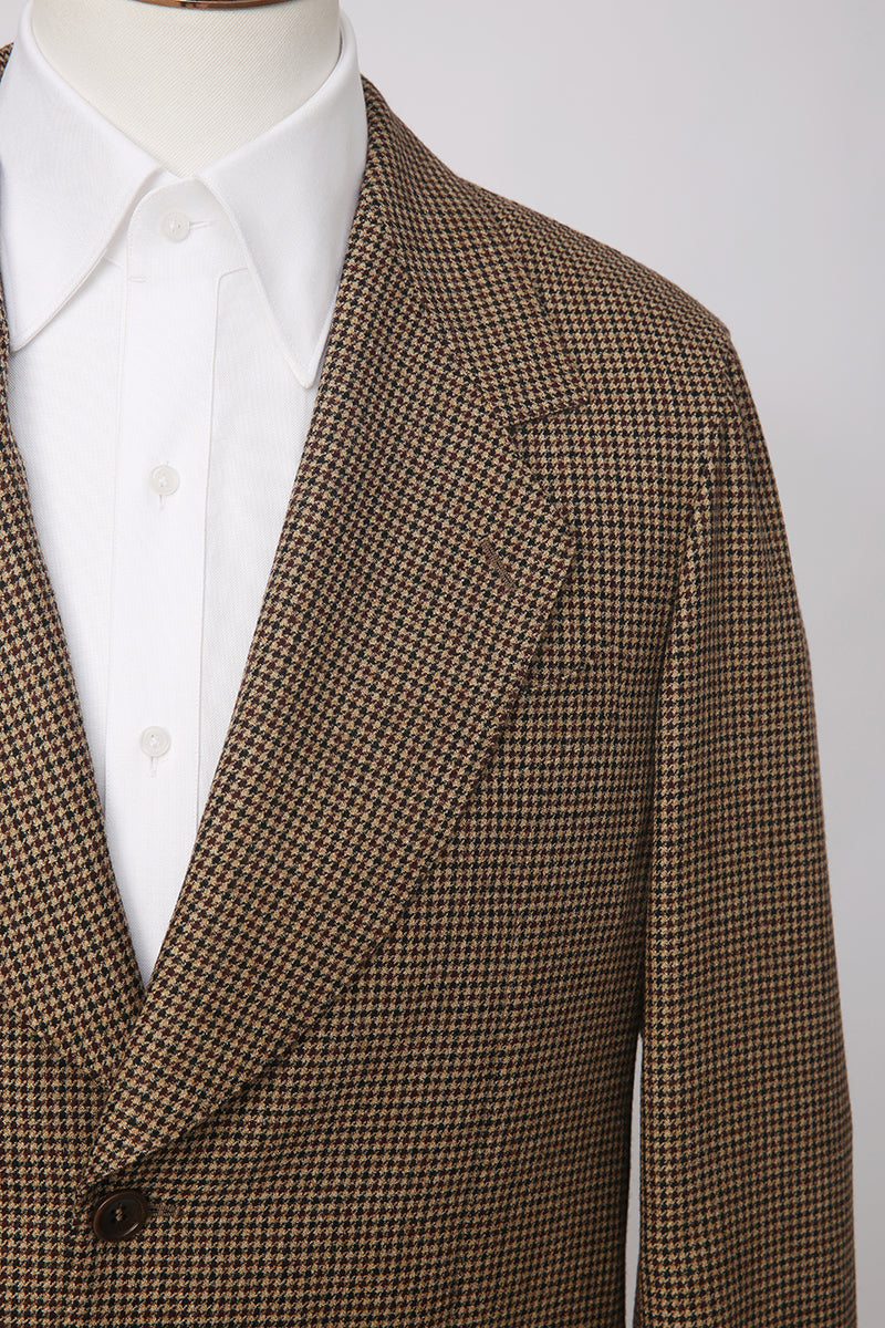Luxury houndstooth fabric texture on bespoke men’s blazer