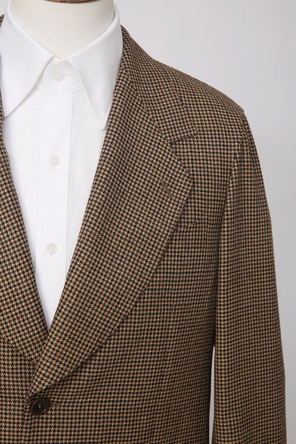 Luxury houndstooth fabric texture on bespoke men’s blazer