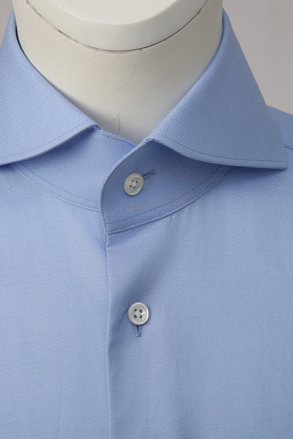 Custom collar and buttons on tailored light blue shirt
