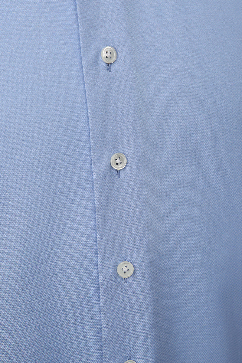 Luxury light blue cotton fabric texture on bespoke shirt