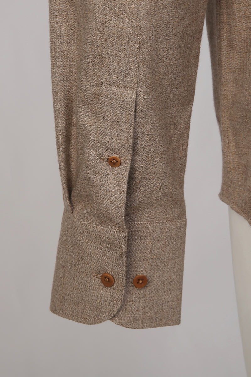 Custom sleeve buttons on tailored yak wool shirt