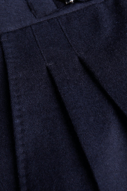 Custom waistband and pleats on tailored navy blue cashmere trousers