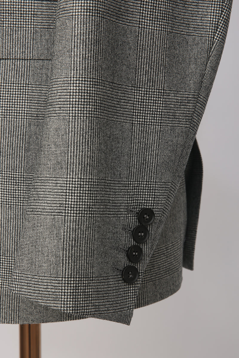 Custom sleeve buttons on tailored grey check Prince of Wales blazer