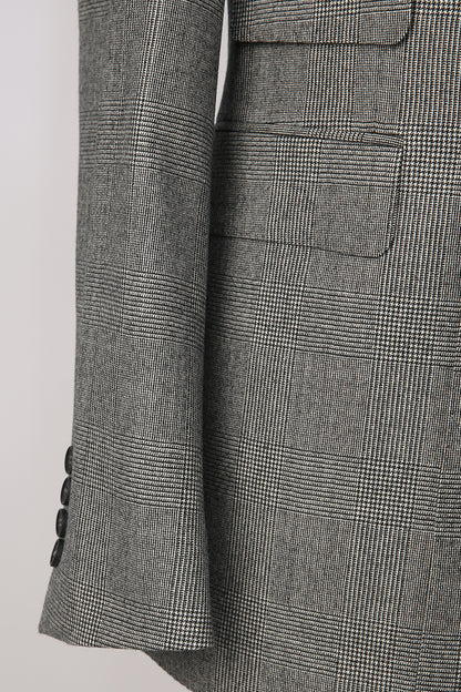 Luxury grey check fabric texture on bespoke Prince of Wales blazer