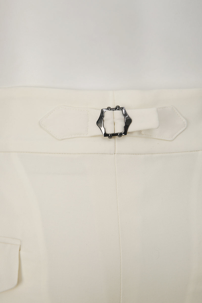 Custom waist adjuster on tailored white trousers