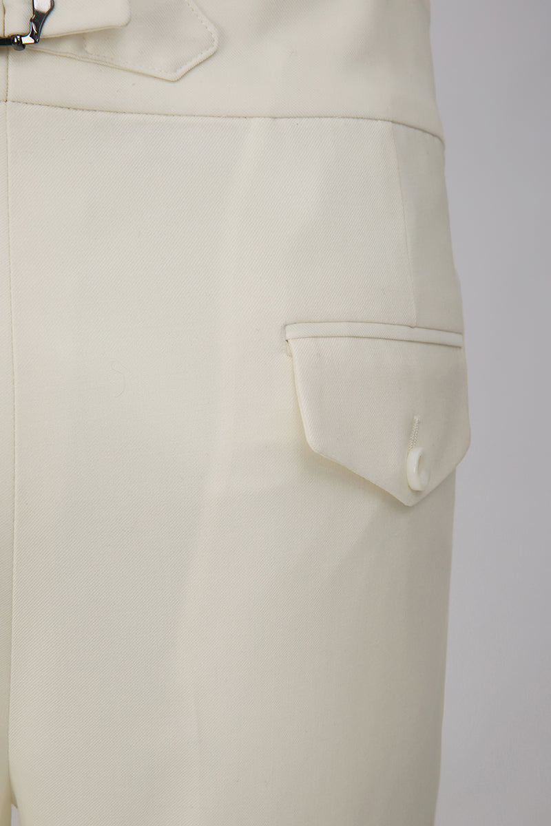 Custom pockets on tailored white trousers