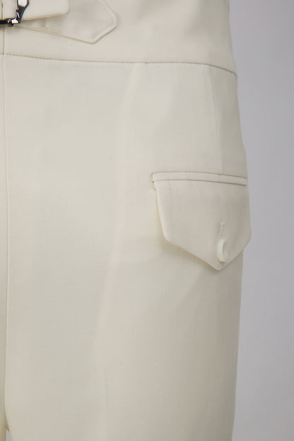 Custom pockets on tailored white trousers