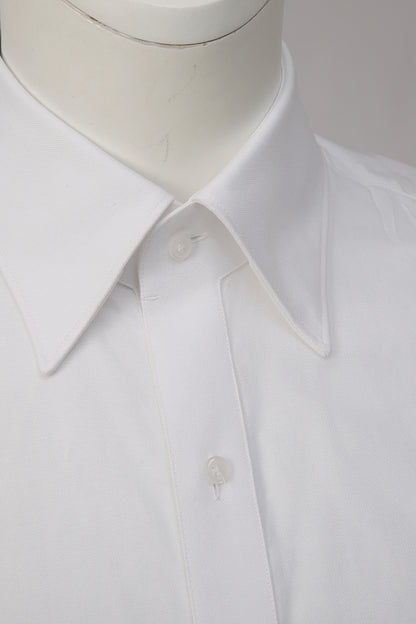 Custom collar and buttons on tailored white dress shirt