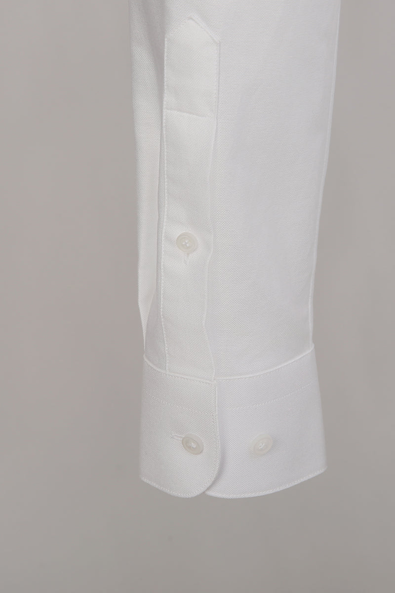 Luxury cotton fabric texture on bespoke white shirt sleeve