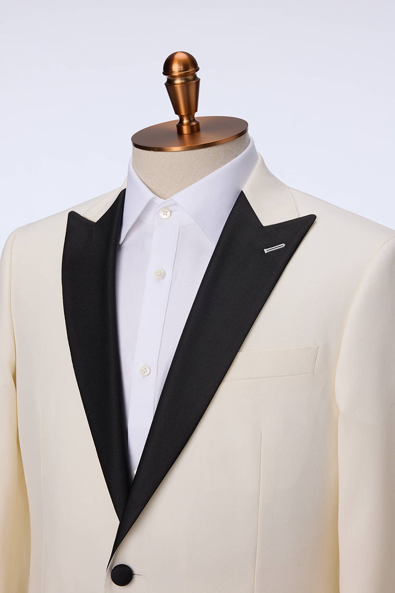 Custom peak lapel and buttons on tailored white dinner jacket tuxedo